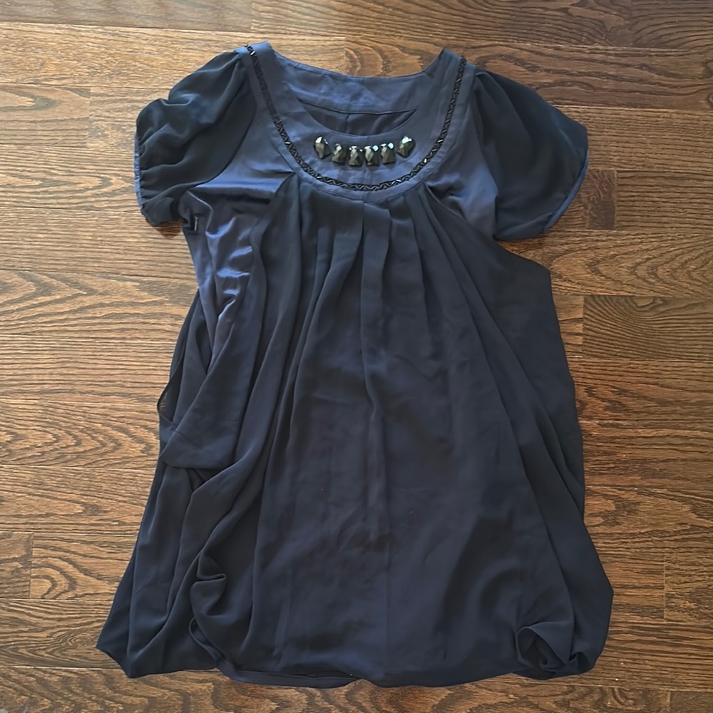 Navy dress with decorative button